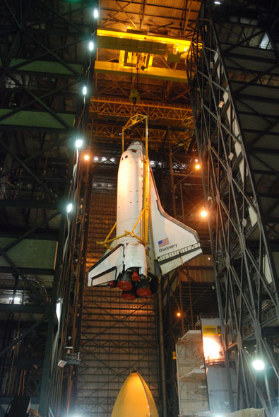 Shuttle Discovery mated with its final boosters and tank